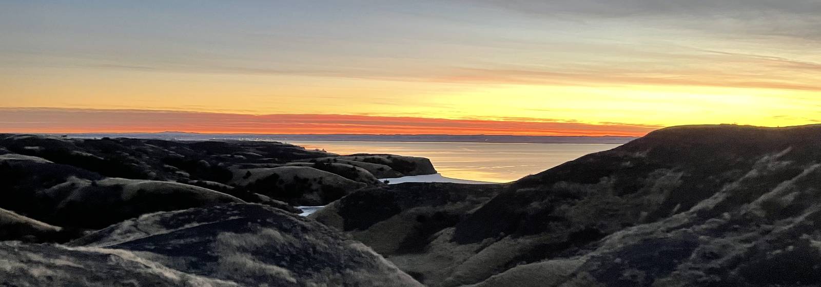 Rugged South Dakota badlands formations at dusk
