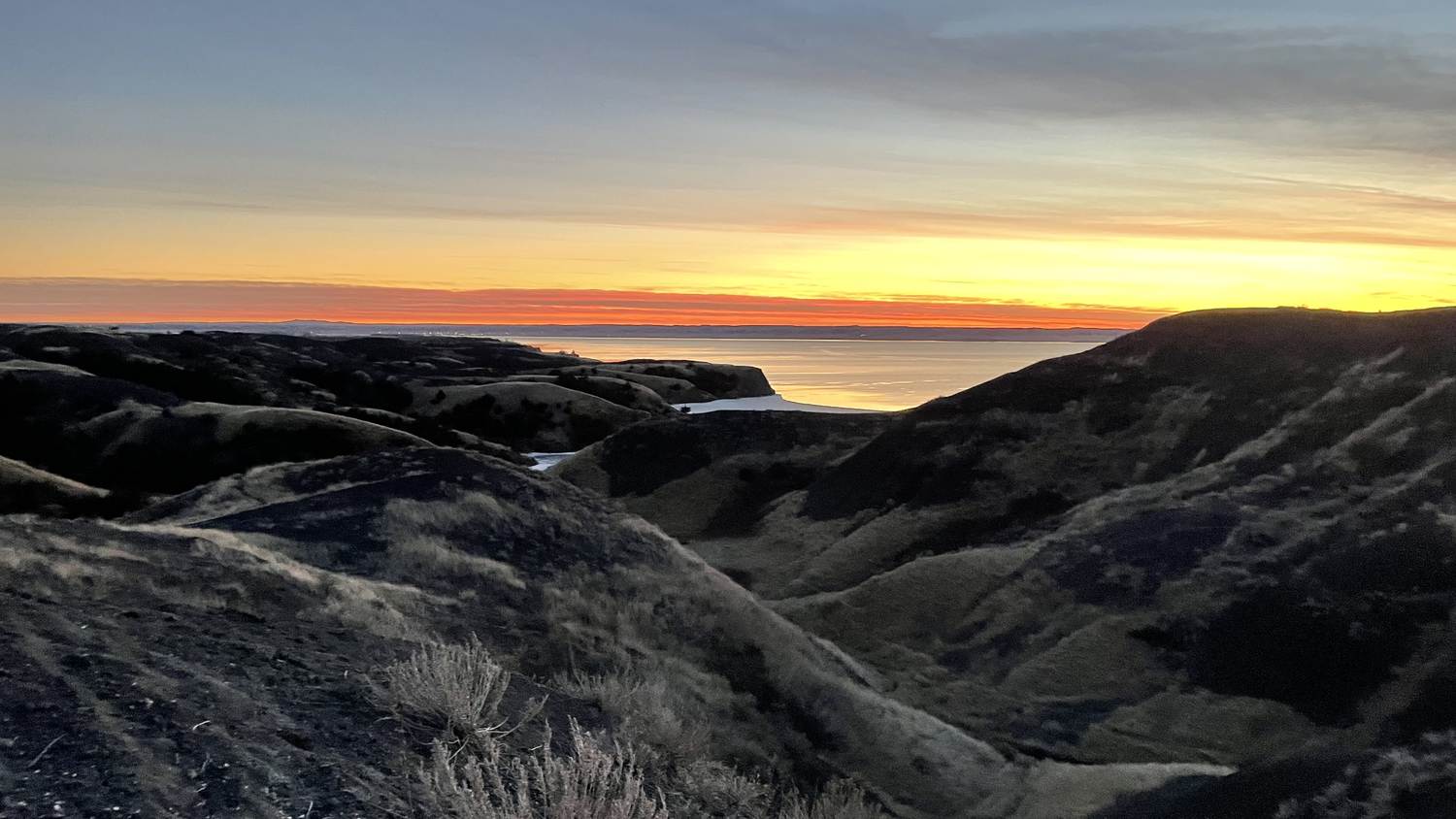 South Dakota badlands glowing at sunset