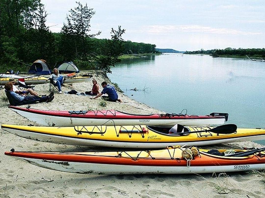 Kayaks beached on a Missouri River sandbar